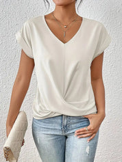 Elegant V-neck top with draped detail - Mila