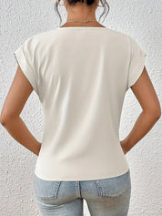Elegant V-neck top with draped detail - Mila